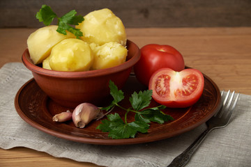 vegetarian food potatoes with tomatoes garlic and parsley