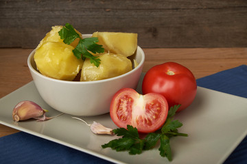vegetarian food potatoes with tomatoes garlic and parsley