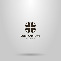 black and white simple vector abstract logo of four hearts or four leaf clover in a round frame
