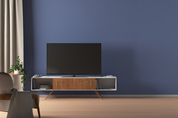 TV on the cabinet in modern living room on blue wall background