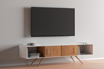 TV screen on the white wall in modern living room.