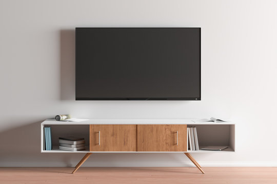 TV Screen On The White Wall In Modern Living Room.