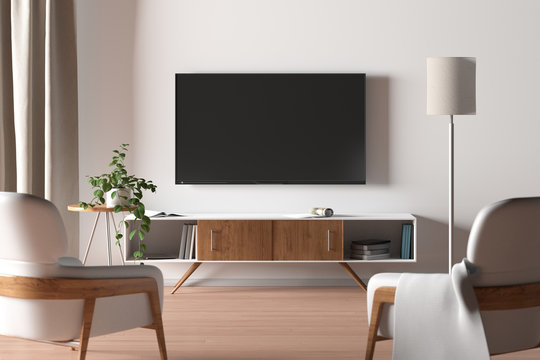 TV screen on the white wall in modern living room.