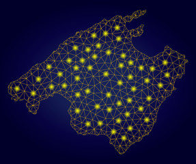 Yellow mesh vector Spain Mallorca Island map with glare effect on a dark blue gradiented background. Abstract lines, light spots and spheric points form Spain Mallorca Island map constellation.