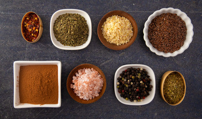 Collage of Various Seasonings Spices and Herbs for Flavorful Cooking and Baking
