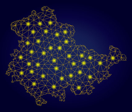 Yellow mesh vector Thuringia Land map with glow effect on a dark blue gradiented background. Abstract lines, light spots and spheric points form Thuringia Land map constellation.