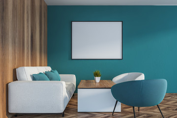 Blue and wooden living room with poster