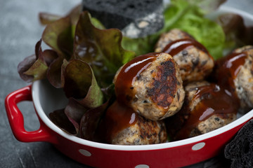 Close-up of roasted truffles made of mushrooms and cheese, selective focus