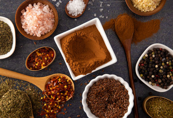 Collage of Various Seasonings Spices and Herbs for Flavorful Cooking and Baking