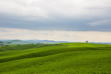 Crete Senesi rolling hills at sunset in Tuscany