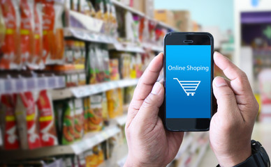 A man using smartphone for shopping online.