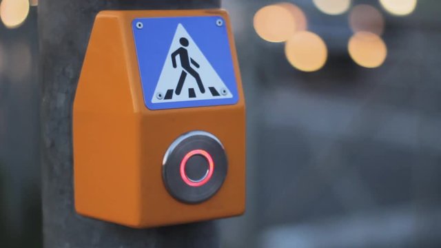 traffic light button pedestrian finger push