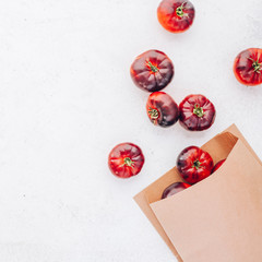 Tomatoes Mar Azul on white wooden table background