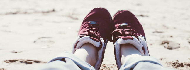 Naklejka premium Girl relaxing on sand beach