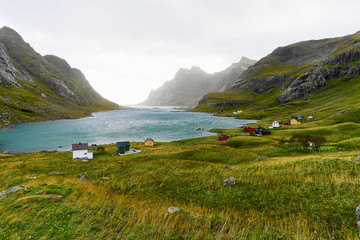 Colorful houses at a beautiful bay in Vinstad on Lofoten Islands in Norway.