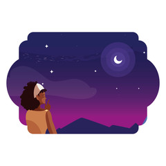 afro woman contemplating horizon in mountains at night scene