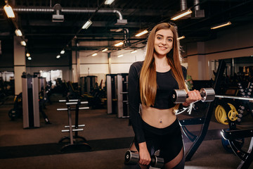 Fototapeta na wymiar Fitness woman in gym