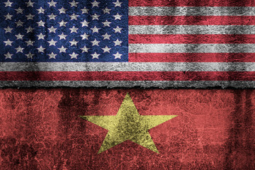 two flags on a cracked wall, USA and Vietnam