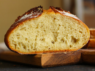white bread round form, fresh pastries. food background. top