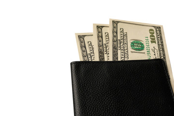 fan of us currency in a black passport isolated on the white background. Passport with U.S. Currency Money as business and money making concept, stock exchange.