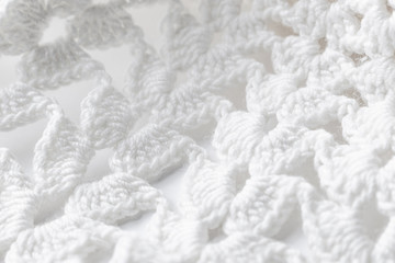 Braided lace closeup. Light textured background.