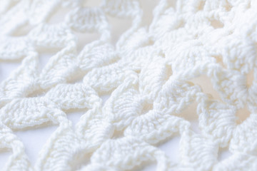 Braided lace closeup. Light textured background.