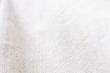 Wicker cloth napkin closeup. Light textured background.