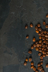 coffee beans (good and bad grain) - arabica and robusta blend (roasted coffee grain). Black background. Top view . Copy space.