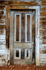 Old weathered door on derelict building, Milton, California 