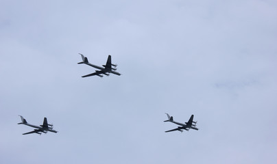 Fototapeta na wymiar Military air force jet planes flying in sky in St. Petersburg, Russia 