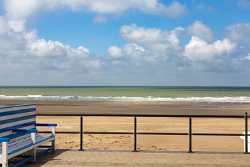 North Sea with cloudy sky and a banck