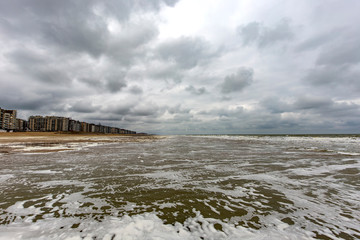 North Sea with cloudy sky and buildings