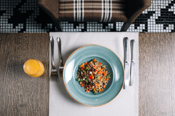 Healthy and delicious bowl with buckwheat and porridge with vegetables at the restaurant