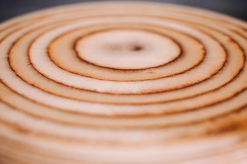 Round wooden chair without a backrest surface