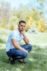 Obraz premium Portrait Of A Handsome Man Smiling At The Camera.