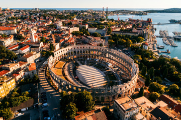 Pula Arena at sunset - HDR aerial view taken by a professional drone. The Roman Amphitheater of...