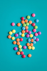 Colorful chocolate candy pills.