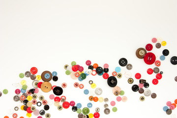 Flat lay with colorful sewing buttons, mock up, top view. Layout buttons mockup on blank white...