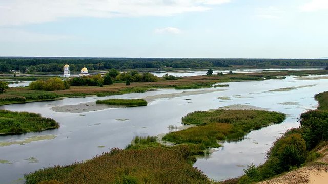 church on the islands Aerial view, The Transfiguration Church in Gusinets village Ukraine aerial view, Christian church on the island