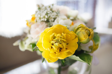 Bright wedding bouquet of spring flowers.