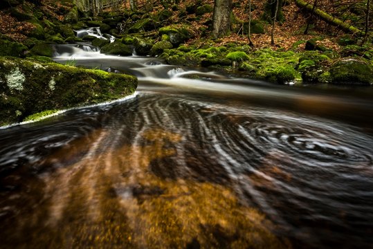 Vortex in mountain stream and mossy stones in mountain forest, Grafenau, Freyung-Grafenau, Bavarian Forest, Lower Bavaria, Germany, Europe
