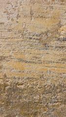 Background of the old wall. Texture of stone surface. Abstract background in retro style. Brown surface of solid material