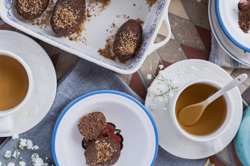 Traditional Russian cake with cocoa in the shape of a ball. Served breakfast table. Top view. Tea and dessert.