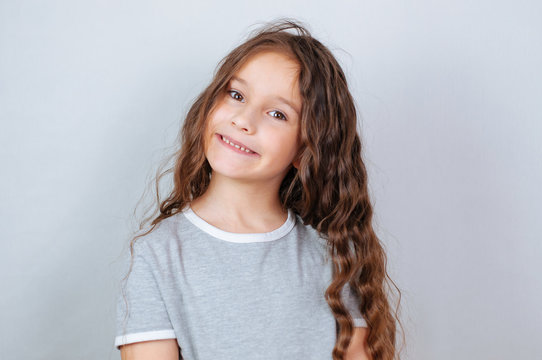 Little child girl posing at studio.Perfect emotional portrait fashion kid. Beautiful face caucasian child 6-7 years
