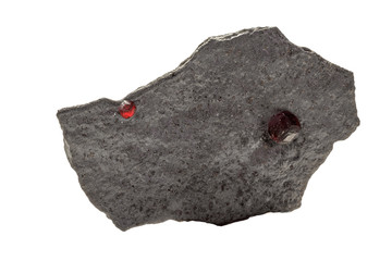 Macro mineral stone Garnet in rock on a white background