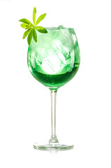 green woodruff drink with ice cubes on white background, isolated