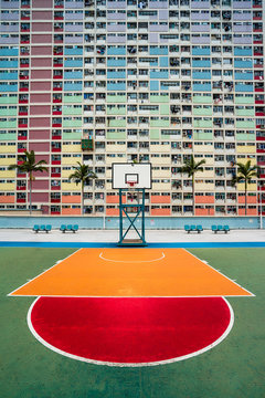 Choi Hung Estate Car Park, narrow apartments in the public housing estate in Hong Kong, with a basketball court. Most popular place for tourists. Empty area, no people