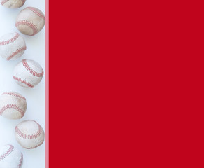 Red baseball sport background with copy space by group of balls.
