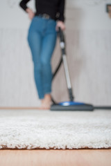 Fototapeta premium clean light carpet after vacuuming, the concept of cleanliness and order