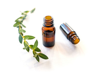 Dark glass bottles with essential oil. Natural remedy.